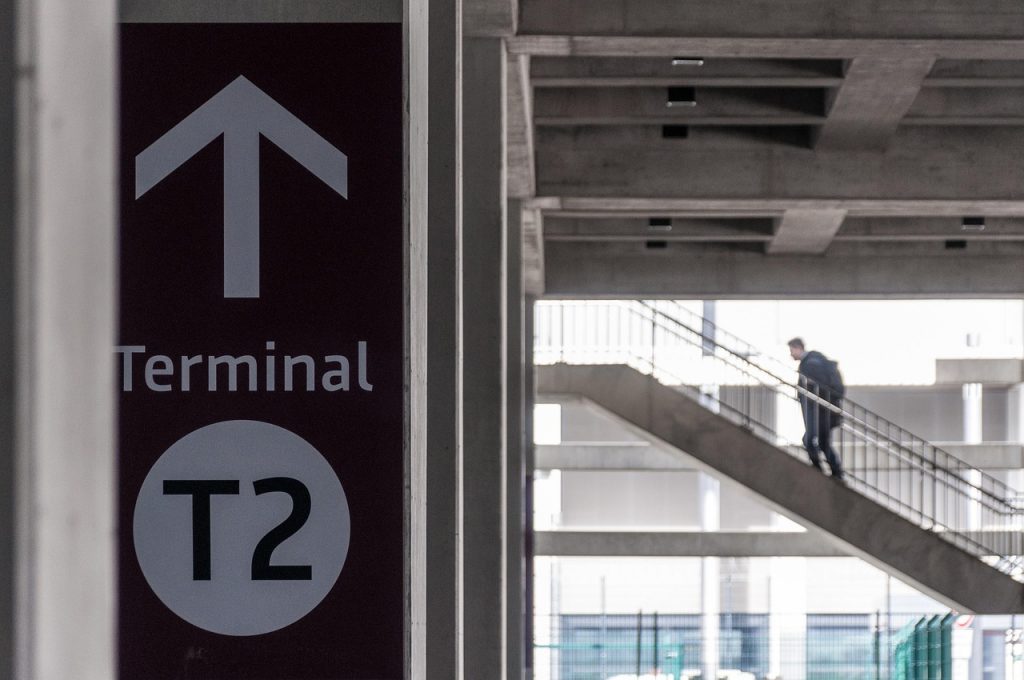 Airport Transfers 9 stairs, airport, terminal, sign, signpost